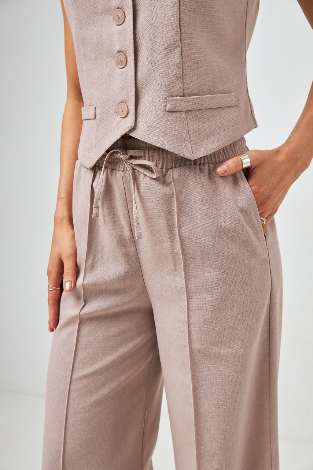 Pantaloni palazzo cu in și talie elastică