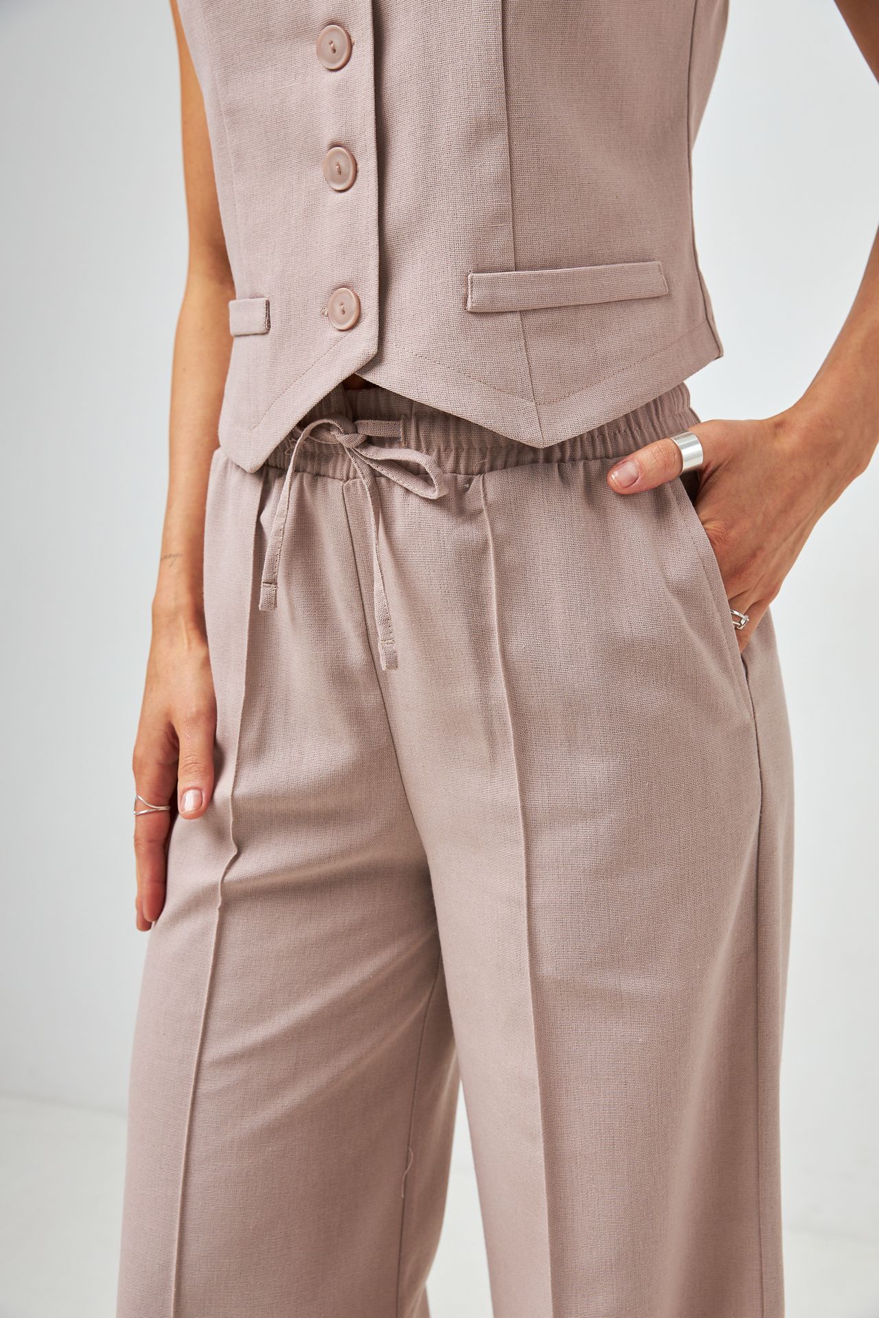 Pantaloni palazzo cu in și talie elastică