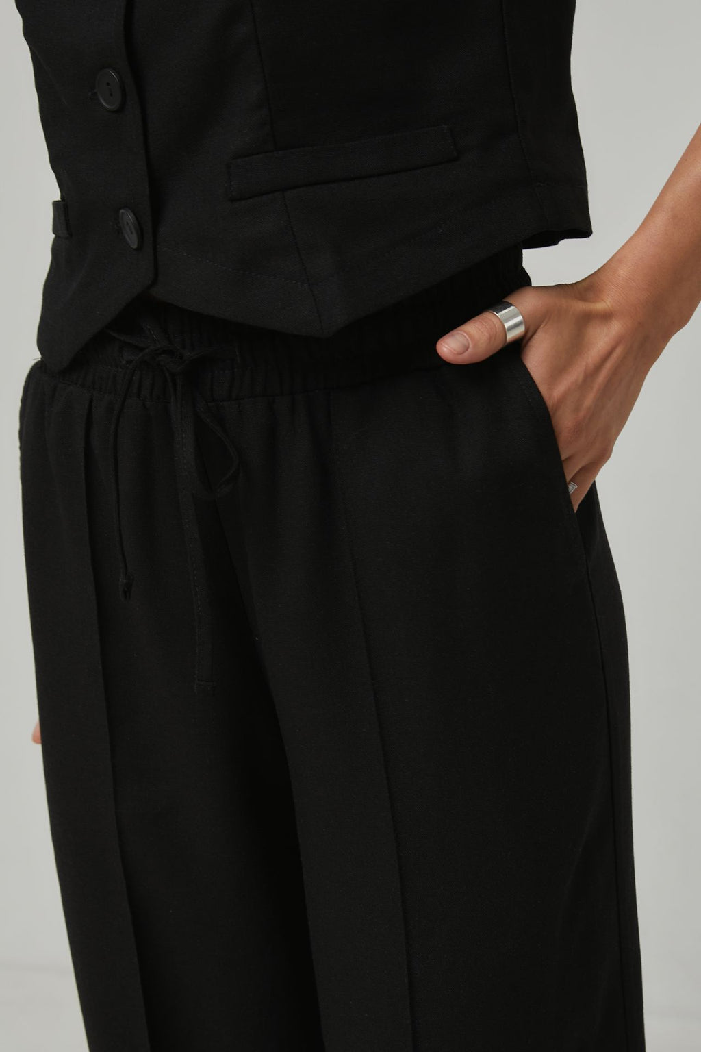 Pantaloni palazzo cu in și talie elastică