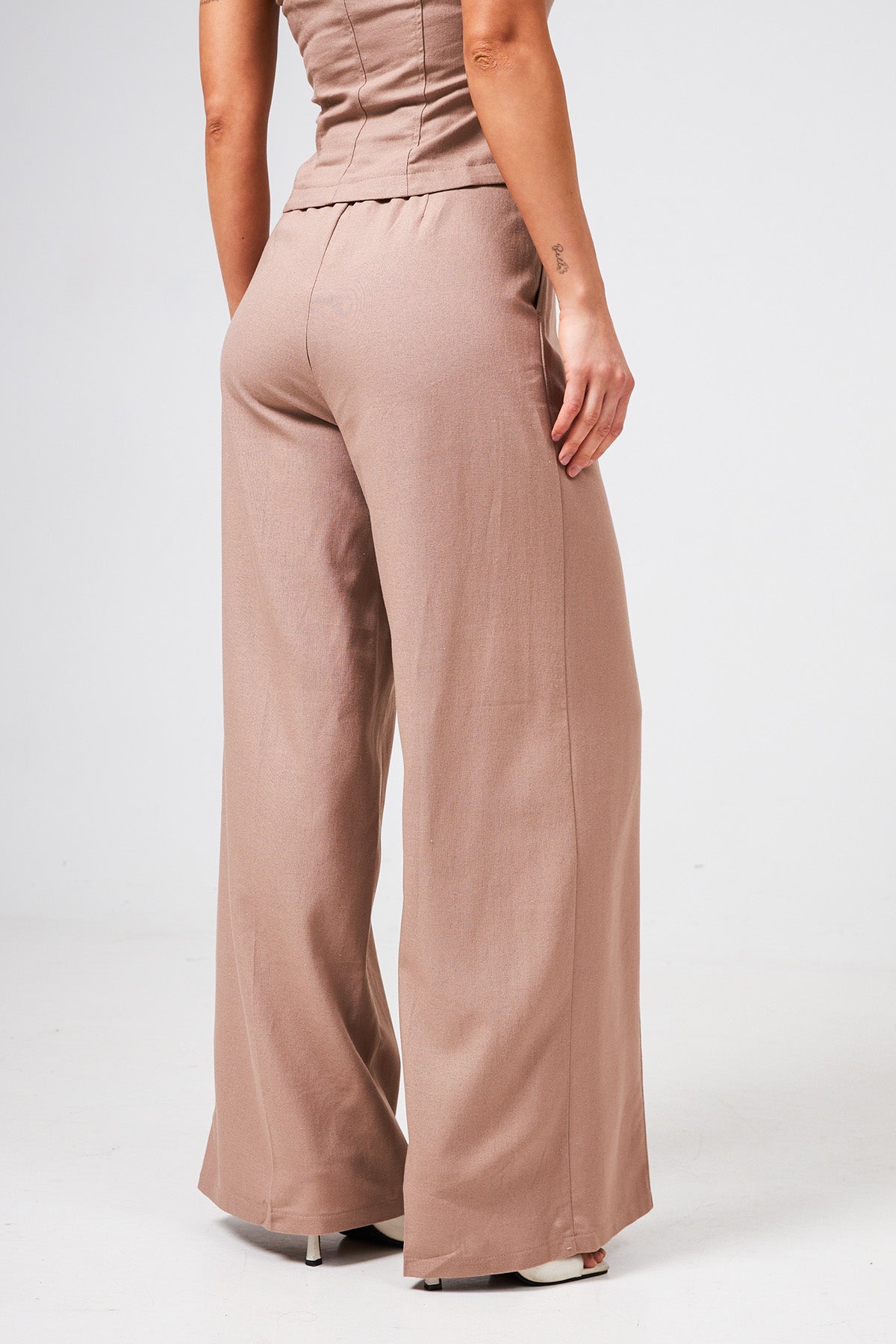 Pantaloni palazzo cu in și dungă