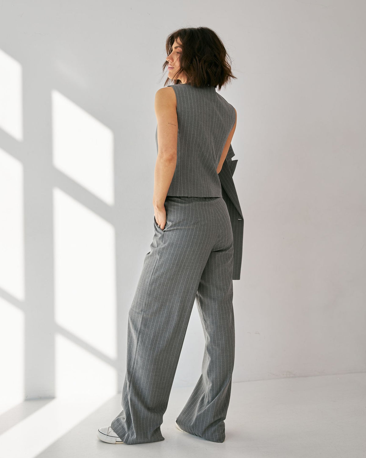 Pantaloni palazzo în dungi