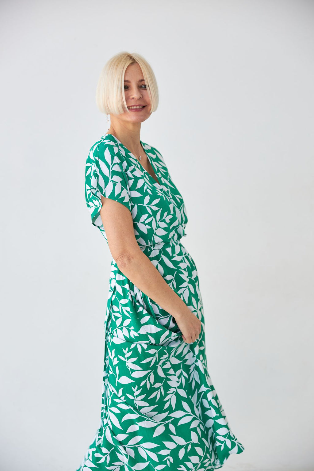 Rochie midi cu bust petrecut și imprimeu floral