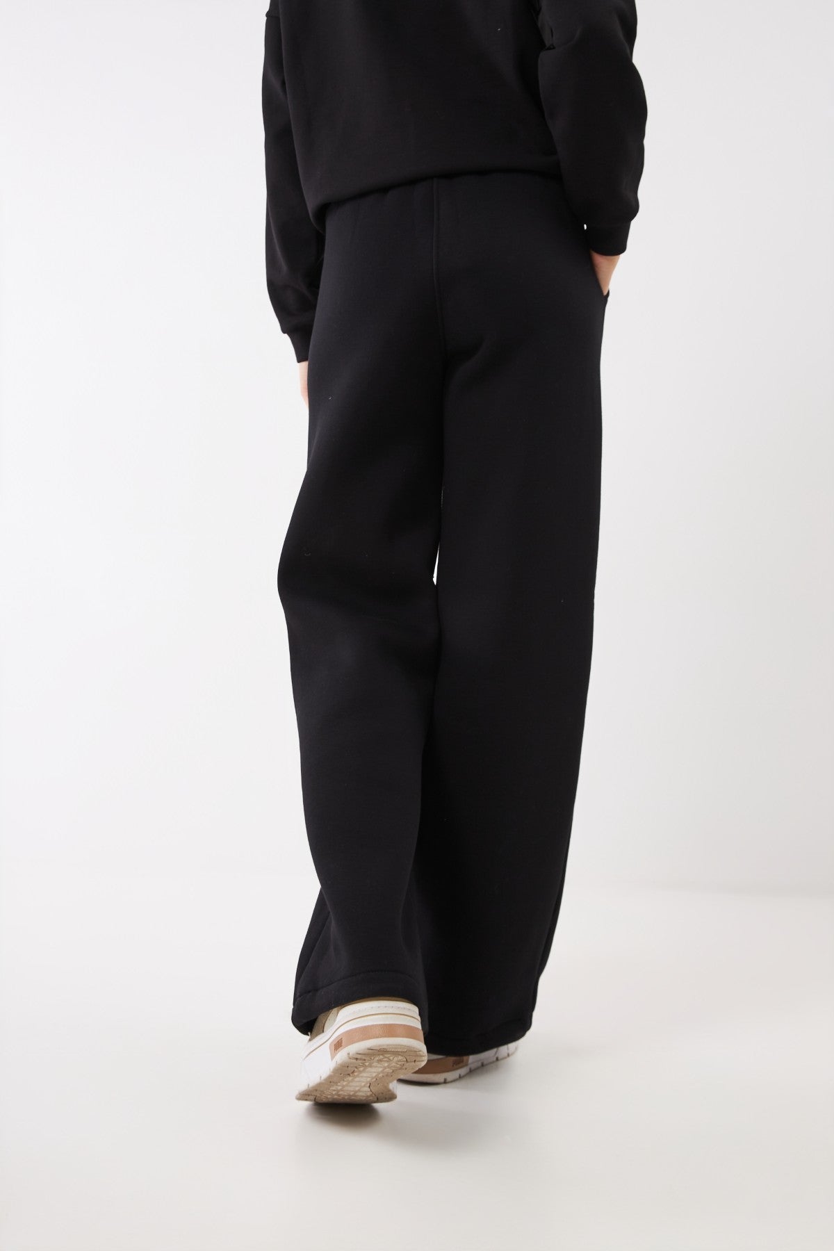 Pantaloni palazzo cu șnur culisant la bază